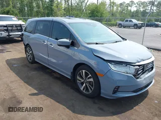 2023 Honda Odyssey Touring with VIN 5FNRL6H86PB057262, listed as a IAAI auction lot 42403319 with 32,548 mi miles and . Bid and sale history available at DreamBid. Image 1.