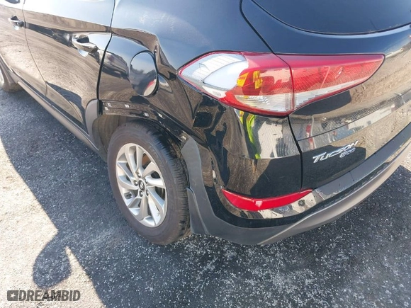 2016 Hyundai Tucson Limited with VIN KM8J33A27GU237225, listed as a IAAI auction lot 41223497 with 158,986 mi miles. Bid and sale history available at carsss.com. Image 6.