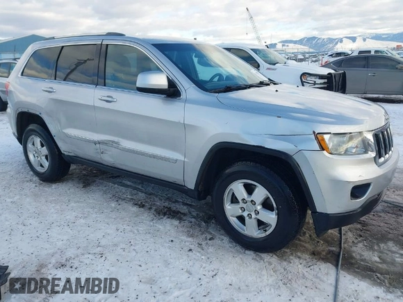 2011 Jeep Grand Cherokee Laredo with VIN 1J4RR4GG7BC584500, listed as a IAAI auction lot 41383355 with 161,722 mi miles. Bid and sale history available at carsss.com. Image 1.