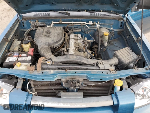 2002 Nissan Frontier XE with VIN 1N6DD26S22C362856, listed as a Copart auction lot 82979184 with 166,432 mi miles and Salvage title. Bid and sale history available at DreamBid. Image 11.