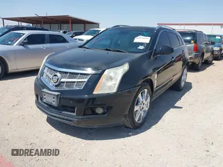 2011 Cadillac SRX Performance Collection z VIN 3GYFNBEYXBS543464, wystawiony jako IAAI lot #42350098 z przebiegiem 146 747 mil mil oraz . Historia ofert i sprzedaży dostępna na DreamBid. Obrazek 2.