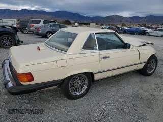 1986 Mercedes-Benz 560 SL with VIN WDBBA48D9GA042092, listed as a Copart auction lot 82438564 with 43,758 mi miles and Salvage Title. Bid and sale history available at DreamBid. Image 3.