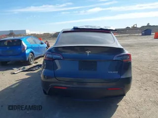 2022 Tesla Model Y Performance z VIN 7SAYGDEF8NF494753, wystawiony jako IAAI lot #41692464 z przebiegiem 14 616 mil mil oraz . Historia ofert i sprzedaży dostępna na DreamBid. Obrazek 16.
