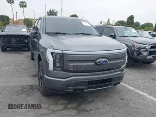 2023 Ford F-150 Lightning Pro with VIN 1FTVW1EL8PWG48559, listed as a IAAI auction lot 42033123 with 8,845 mi miles. Bid and sale history available at carsss.com. Image 1.