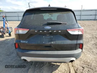 2021 Ford Escape S с VIN 1FMCU0F64MUA47572, выставлен на аукционе Copart как лот 52890665 с пробегом Не указан миль и Списание • Salvage title. История ставок и продаж доступна на DreamBid. Изображение 6.