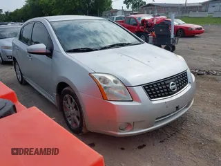 2011 Nissan Sentra S z VIN 3N1AB6APXBL629884, wystawiony jako IAAI lot #42434237 z przebiegiem 122 447 mil mil oraz . Historia ofert i sprzedaży dostępna na DreamBid. Obrazek 1.