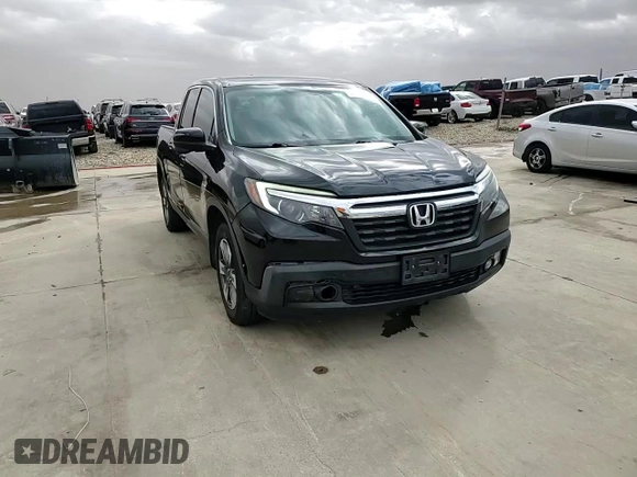 2019 Honda Ridgeline RTL-T with VIN 5FPYK2F65KB002634, listed as a Copart auction lot 47598885 with 65,550 mi miles and Salvage title. Bid and sale history available at DreamBid. Image 14.