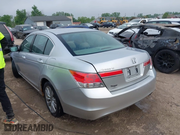 2011 Honda Accord EX with VIN 1HGCP2F79BA048703, listed as a IAAI auction lot 42425363 with 216,233 mi miles and . Bid and sale history available at DreamBid. Image 3.