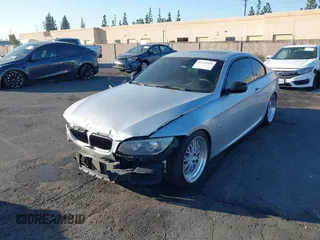 2011 BMW 3 Series 335is with VIN WBAKG1C57BE618727, listed as a IAAI auction lot 41234102 with 154,007 mi miles and . Bid and sale history available at carsss.com. Image 2.