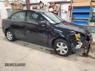 2010 Kia Rio with VIN KNADH4B37A6641845, listed as a Copart auction lot 51861215 with 163,894 mi miles and Salvage Title. Bid and sale history available at DreamBid. Image 4.