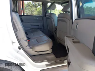2012 Honda Pilot EX-L with VIN 5FNYF3H58CB014754, listed as a IAAI auction lot 42120220 with 166,783 mi miles. Bid and sale history available at carsss.com. Image 8.