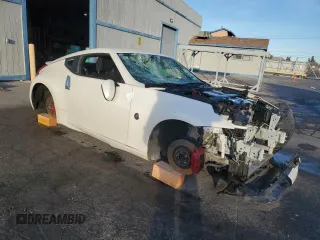 2015 Nissan 370Z Sport with VIN JN1AZ4EH9FM444692, listed as a Copart auction lot 45314215 with 99,999 mi miles and Clean Title. Bid and sale history available at carsss.com. Image 4.