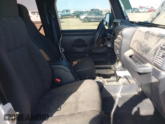 2005 Jeep Wrangler Sport with VIN 1J4FA49SX5P336380, listed as a IAAI auction lot 41752554 with 139,004 mi miles. Bid and sale history available at carsss.com. Image 5.