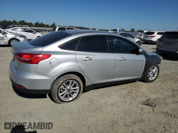 2018 Ford Focus SE with VIN 1FADP3FE4JL308909, listed as a Copart auction lot 61489005 with 58,613 mi miles and Salvage title. Bid and sale history available at DreamBid. Image 3.