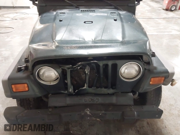 2003 Jeep Wrangler X z VIN 1J4FA39S43P339234, wystawiony jako IAAI lot #41329654 z przebiegiem 175 376 mil mil oraz . Historia ofert i sprzedaży dostępna na DreamBid. Obrazek 6.