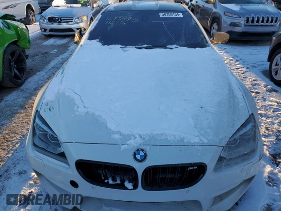 2014 BMW M6 z VIN WBSLX9C51ED160286, wystawiony jako Copart lot #38369134 z przebiegiem Nie podano mil oraz Szkody całkowita. Historia ofert i sprzedaży dostępna na DreamBid. Obrazek 5.