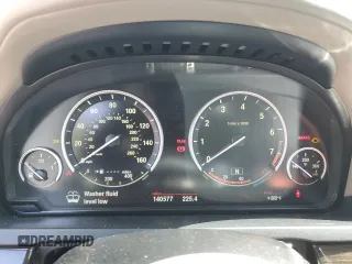 2012 BMW 7 Series 740Li with VIN WBAKB4C55CC575826, listed as a Copart auction lot 74012564 with 140,577 mi miles and Salvage Title. Bid and sale history available at carsss.com. Image 9.