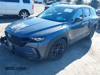 2024 Mazda CX-50 S Select with VIN 7MMVABAMXRN238079, listed as a IAAI auction lot 41563281 with 5,576 mi miles and . Bid and sale history available at DreamBid. Image 2.