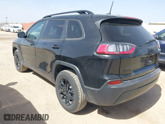 2023 Jeep Cherokee Altitude Lux with VIN 1C4PJMMB9PD111700, listed as a IAAI auction lot 41844750 with 57,441 mi miles. Bid and sale history available at carsss.com. Image 3.