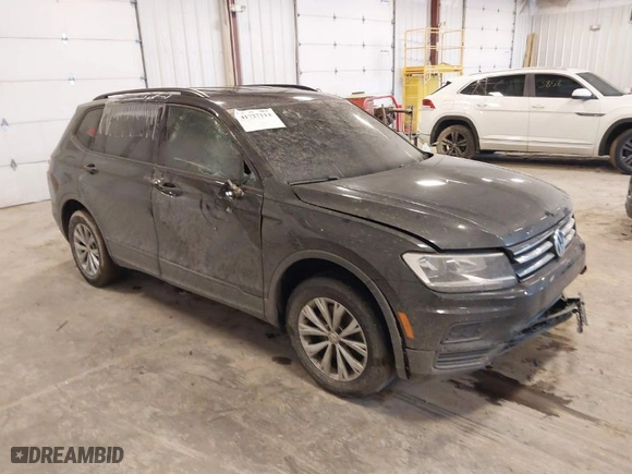 2019 Volkswagen Tiguan S with VIN 3VV0B7AX3KM182311, listed as a IAAI auction lot 41727114 with 98,035 mi miles. Bid and sale history available at carsss.com. Image 1.