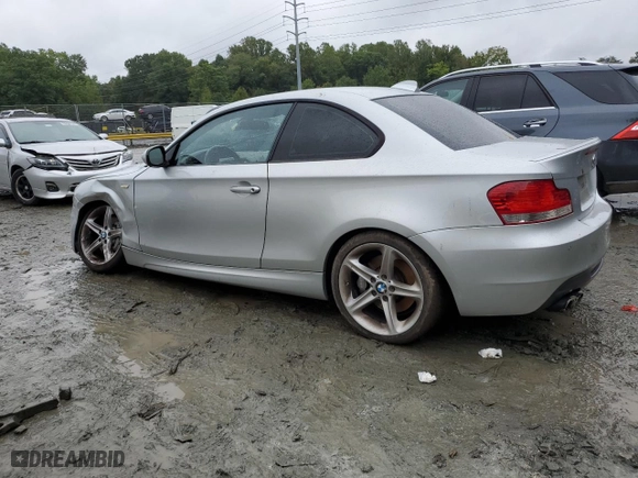 2011 BMW 1 Series 135i with VIN WBAUC9C56BVM09045, listed as a Copart auction lot 73316874 with 125,679 mi miles and Salvage Title. Bid and sale history available at carsss.com. Image 2.
