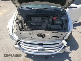 2015 Ford Taurus SEL z VIN 1FAHP2E82FG108442, wystawiony jako Copart lot #57790515 z przebiegiem 116 834 mil mil oraz Szkoda całkowita • Salvage title. Historia ofert i sprzedaży dostępna na DreamBid. Obrazek 11.