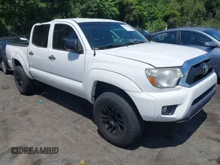 2015 Toyota Tacoma with VIN 3TMLU4EN1FM195626, listed as a IAAI auction lot 42571649 with 135,699 mi miles and . Bid and sale history available at DreamBid. Image 1.
