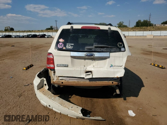 2012 Ford Escape Hybrid z VIN 1FMCU5K3XCKA58465, wystawiony jako Copart lot #75527194 z przebiegiem 263 996 mil mil oraz Szkoda całkowita • Salvage title. Historia ofert i sprzedaży dostępna na DreamBid. Obrazek 6.