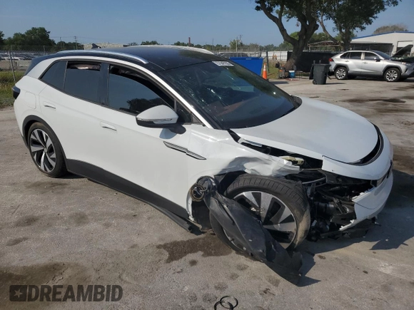 2021 Volkswagen ID.4 Pro S z VIN WVGKMPE22MP046499, wystawiony jako Copart lot #57947235 z przebiegiem 26 759 mil mil oraz Nie do naprawy • Non repairable. Historia ofert i sprzedaży dostępna na DreamBid. Obrazek 4.