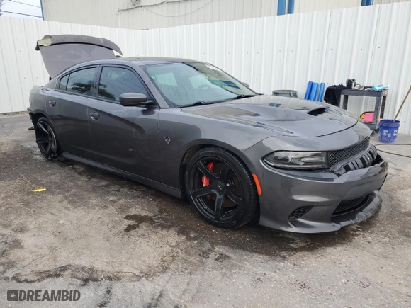 2017 Dodge Charger SRT Hellcat with VIN 2C3CDXL96HH649057, listed as a Copart auction lot 88979705 with 68,164 mi miles and Clean Title. Bid and sale history available at carsss.com. Image 4.