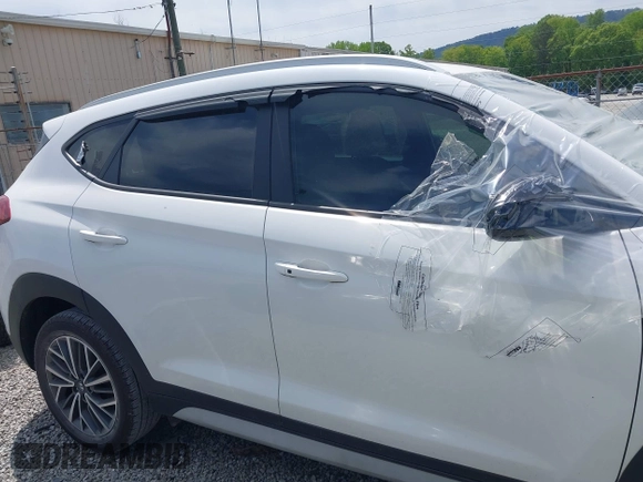 2019 Hyundai Tucson Sport with VIN KM8J33AL5KU066119, listed as a IAAI auction lot 42041651 with 60,281 mi miles. Bid and sale history available at carsss.com. Image 13.