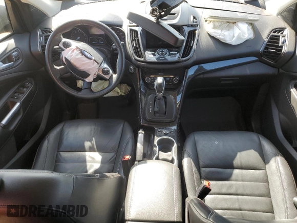 2016 Ford Escape Titanium with VIN 1FMCU9J96GUC63384, listed as a Copart auction lot 52255725 with 136,869 mi miles and Salvage Title. Bid and sale history available at carsss.com. Image 8.