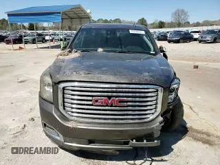 2019 GMC Yukon SLT with VIN 1GKS1BKC1KR117730, listed as a Copart auction lot 49438235 with 147,347 mi miles and Salvage Title. Bid and sale history available at carsss.com. Image 11.