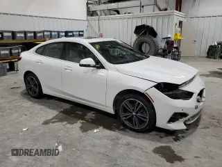 2021 BMW 2 Series 228i xDrive with VIN WBA73AK01M7H65644, listed as a Copart auction lot 47182605 with 60,793 mi miles and Salvage Title. Bid and sale history available at DreamBid. Image 4.
