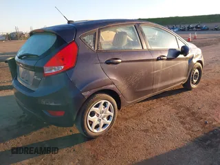 2013 Ford Fiesta S with VIN 3FADP4TJ8DM132523, listed as a IAAI auction lot 41700402 with 53,835 mi miles and . Bid and sale history available at DreamBid. Image 4.