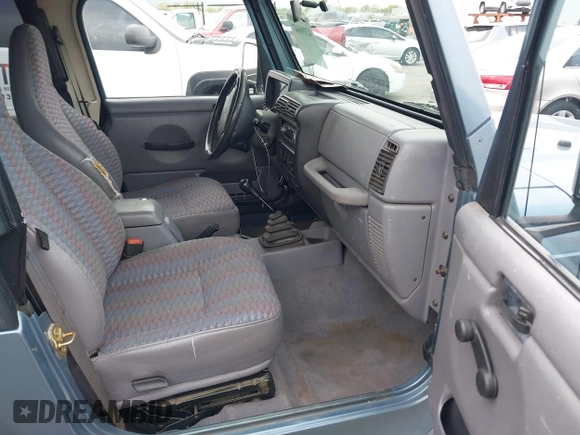 1998 Jeep Wrangler Sport with VIN 1J4FY19S8WP781437, listed as a IAAI auction lot 42096647 with 245,900 mi miles. Bid and sale history available at carsss.com. Image 5.