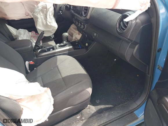 2019 Toyota Tacoma 4WD SR with VIN 3TMCZ5AN0KM260201, listed as a IAAI auction lot 42017048 with 49,216 mi miles. Bid and sale history available at carsss.com. Image 5.