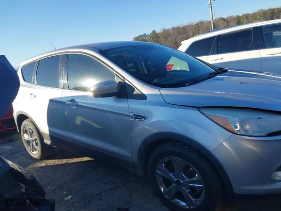 2015 Ford Escape SE with VIN 1FMCU0G92FUC74433, listed as a IAAI auction lot 41262018 with 114,252 mi miles. Bid and sale history available at carsss.com. Image 13.