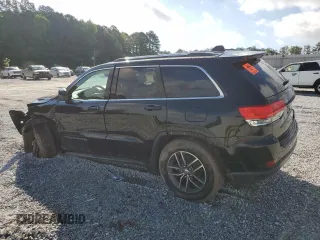2018 Jeep Grand Cherokee Laredo E with VIN 1C4RJEAGXJC246874, listed as a Copart auction lot 56722005 with 101,493 mi miles and Salvage title. Bid and sale history available at DreamBid. Image 2.