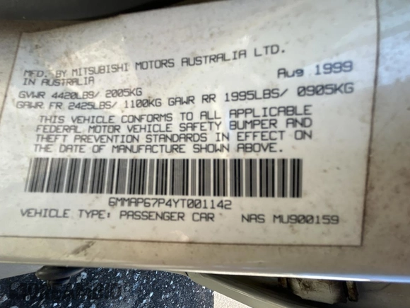 2000 Mitsubishi Diamante LS z VIN 6MMAP67P4YT001142, wystawiony jako Copart lot #49667135 z przebiegiem 243 861 mil mil oraz Tytuł czysty. Historia ofert i sprzedaży dostępna na DreamBid. Obrazek 10.