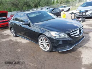 2014 Mercedes-Benz E E 350 Sport with VIN WDDHF5KB4EA879619, listed as a IAAI auction lot 42122078 with 148,703 mi miles. Bid and sale history available at carsss.com. Image 1.