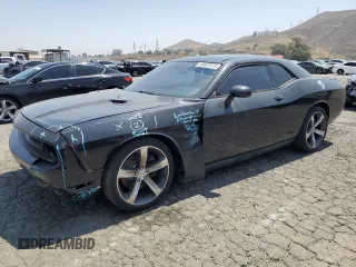 2014 Dodge Challenger R/T Plus z VIN 2C3CDYBT1EH294121, wystawiony jako Copart lot #60687575 z przebiegiem 121 607 mil mil oraz Szkoda całkowita • Salvage title. Historia ofert i sprzedaży dostępna na DreamBid. Obrazek 1.