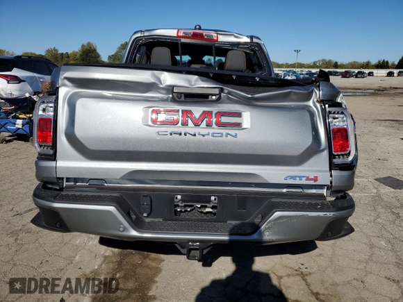 2024 GMC Canyon 4WD AT4 with VIN 1GTP6DEK8R1264699, listed as a Copart auction lot 76604464 with 2,406 mi miles and Salvage Title. Bid and sale history available at carsss.com. Image 6.