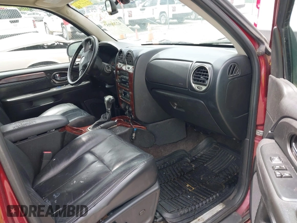 2006 GMC Envoy SLE z VIN 1GKDT13S262222939, wystawiony jako IAAI lot #42210957 z przebiegiem 238 217 mil mil oraz . Historia ofert i sprzedaży dostępna na DreamBid. Obrazek 5.