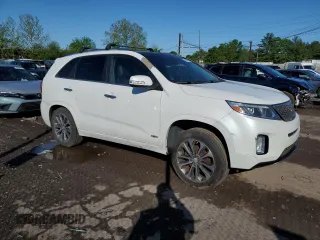 2014 Kia Sorento SX z VIN 5XYKWDA77EG522815, wystawiony jako Copart lot #56061415 z przebiegiem Nie podano mil oraz Czysty tytuł • Clean title. Historia ofert i sprzedaży dostępna na DreamBid. Obrazek 4.