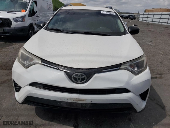 2018 Toyota RAV4 LE with VIN JTMBFREV9JD256759, listed as a Copart auction lot 51165835 with 128,253 mi miles and Salvage Title. Bid and sale history available at carsss.com. Image 5.