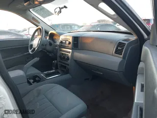 2006 Jeep Grand Cherokee Laredo with VIN 1J8GS48K16C348315, listed as a IAAI auction lot 41062772 with 239,662 mi miles. Bid and sale history available at carsss.com. Image 5.