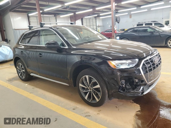 2021 Audi Q5 Premium Plus with VIN WA1BAAFY8M2116737, listed as a Copart auction lot 55652865 with 63,176 mi miles and Salvage title. Bid and sale history available at DreamBid. Image 4.