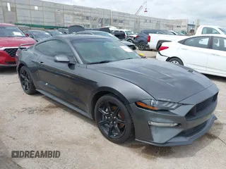 2019 Ford Mustang EcoBoost with VIN 1FA6P8TH6K5106082, listed as a IAAI auction lot 42466881 with 105,323 mi miles and . Bid and sale history available at DreamBid. Image 1.
