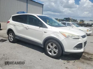 2013 Ford Escape SE z VIN 1FMCU0GX6DUD64499, wystawiony jako Copart lot #60971245 z przebiegiem 63 411 mil mil oraz Szkoda całkowita • Salvage title. Historia ofert i sprzedaży dostępna na DreamBid. Obrazek 4.